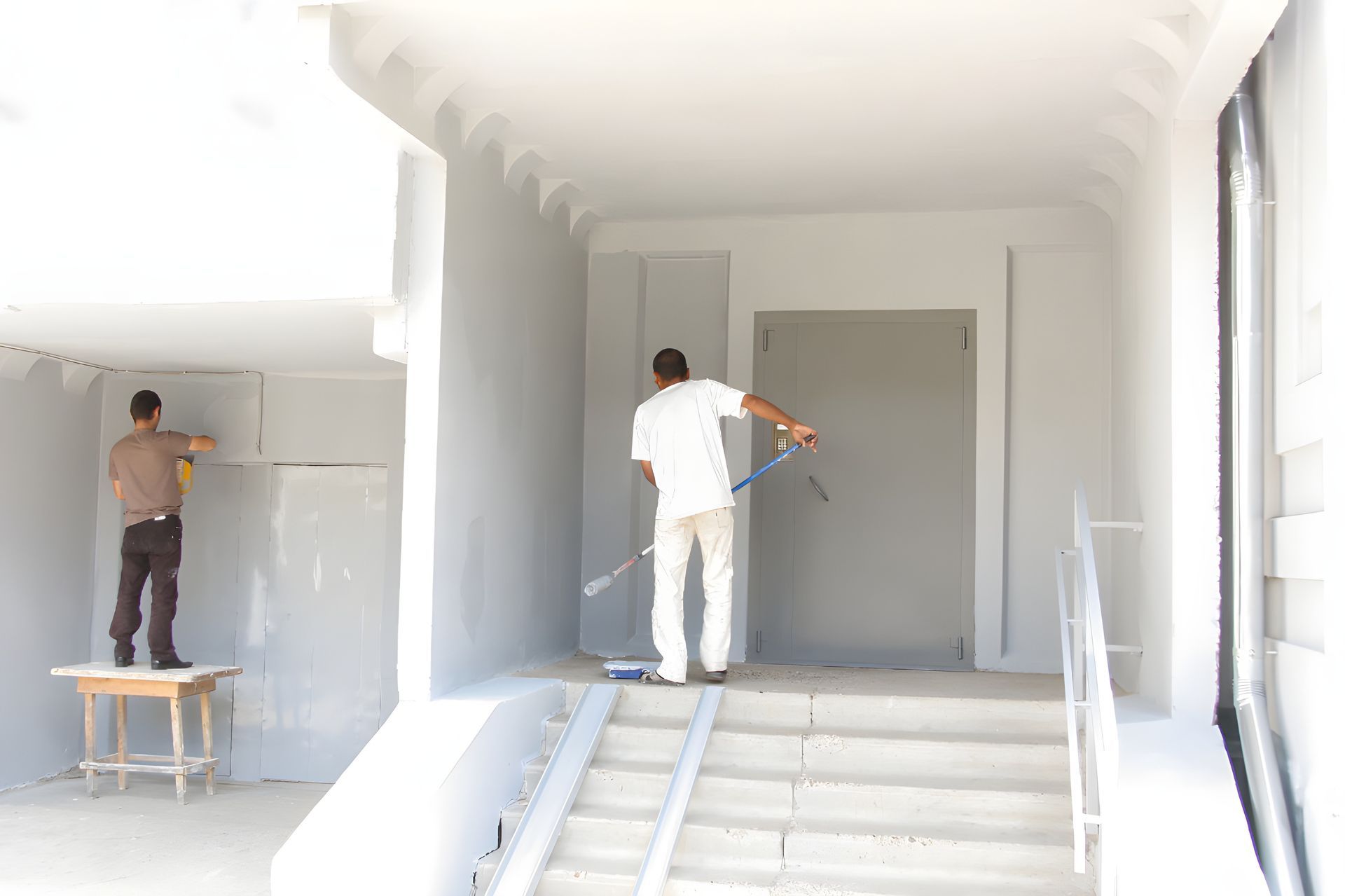 Man is Painting a Wall — Paint & Decor in Mount Isa City, QLD