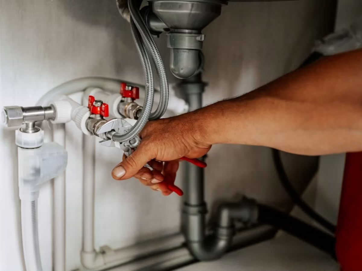 plumber working with tools