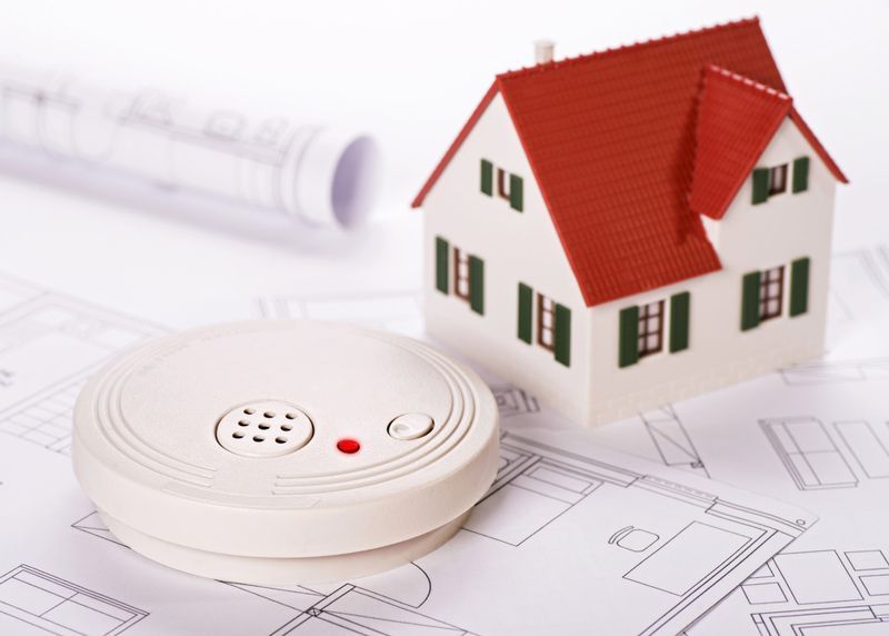 Miniature House And Smoke Detector — Fire Safety in Tamworth, NSW