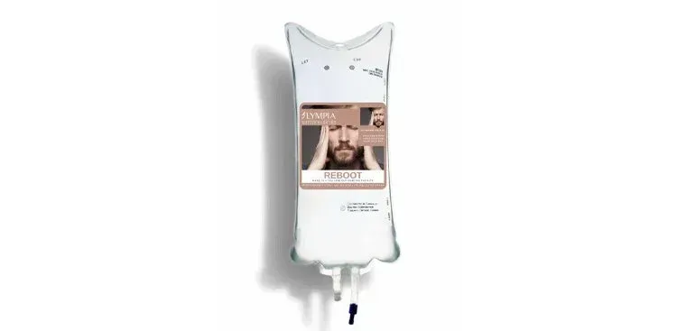 Wall-mounted white dispenser with a rectangular label showing a close-up of a man's face and beard.