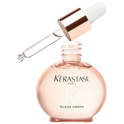 Kérastase Paris Glaze Drops pink glass hair serum bottle with a dropper applicator