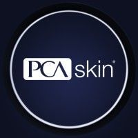 PCA Skin logo in white on a dark blue circular background