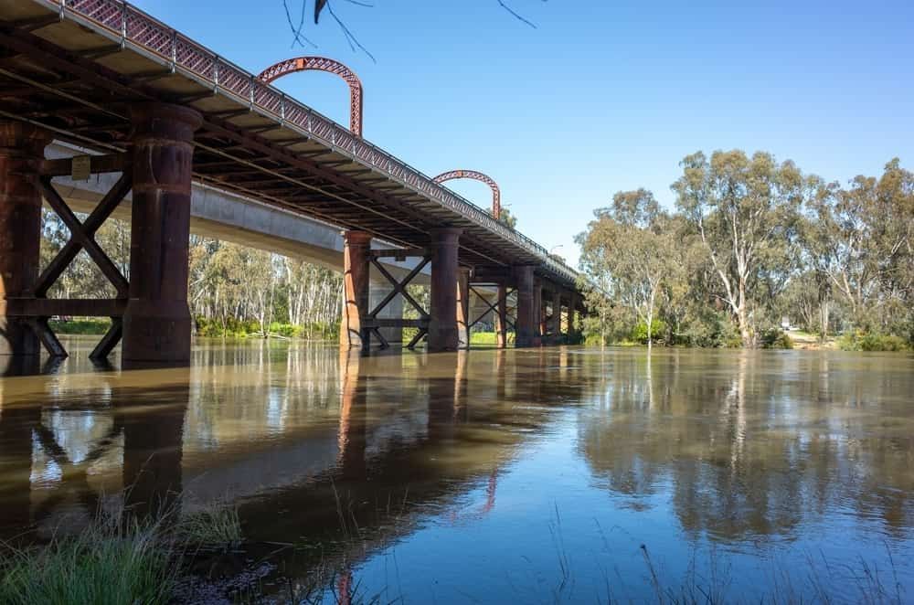 A Bridge Over a Body of Water With Trees in the Background — Shepparton Radiators & Windscreens in Echuca, VIC