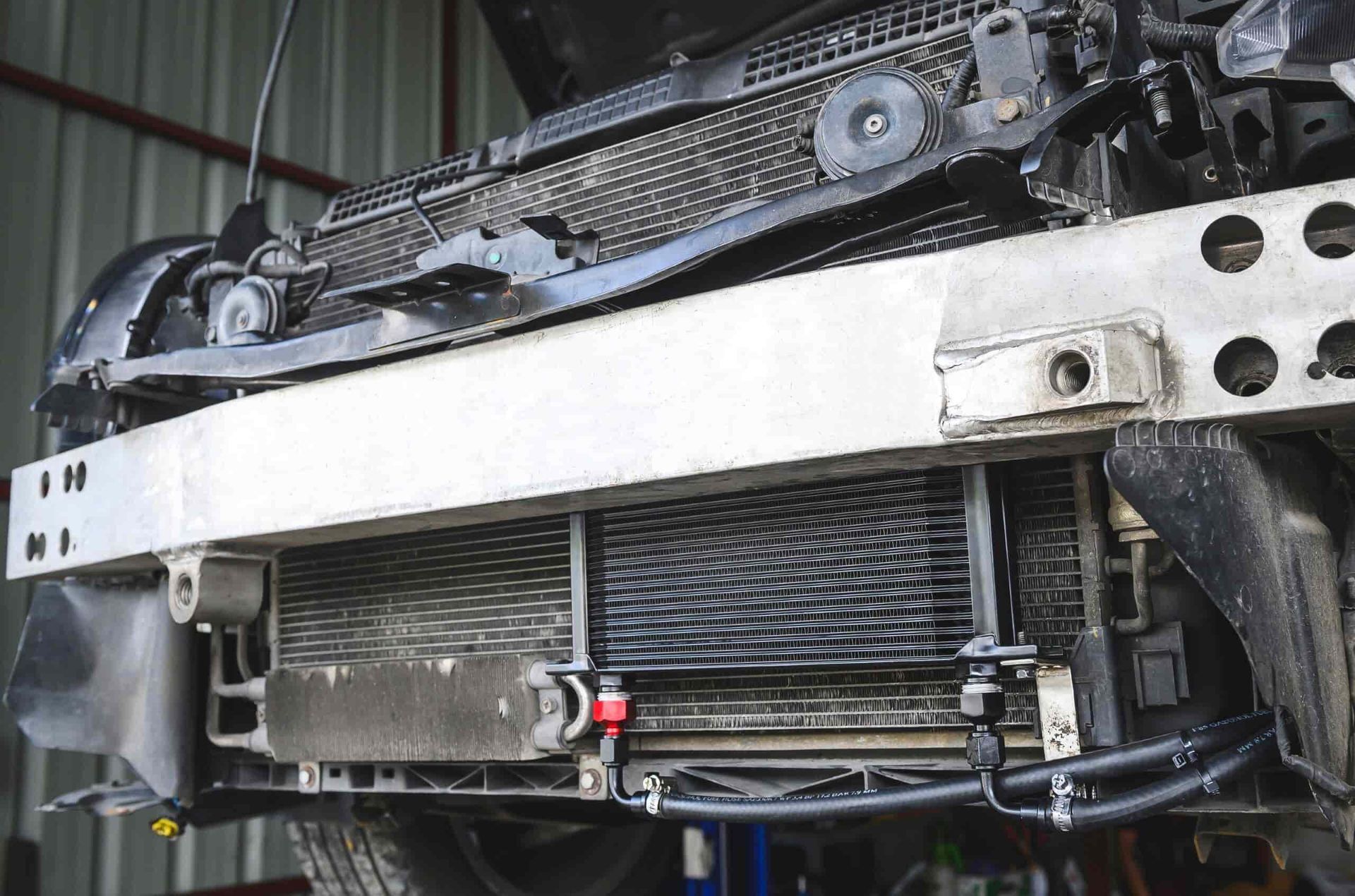 A Close Up of a Radiator on the Front of a Car — Shepparton Radiators & Windscreens in Yarrawonga, VIC