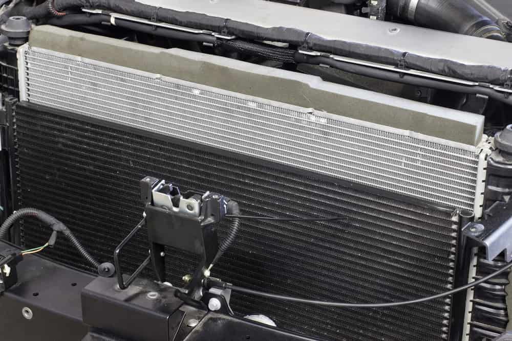 A Close Up of a Radiator in the Engine Compartment of a Car — Shepparton Radiators & Windscreens in Cobram, VIC
