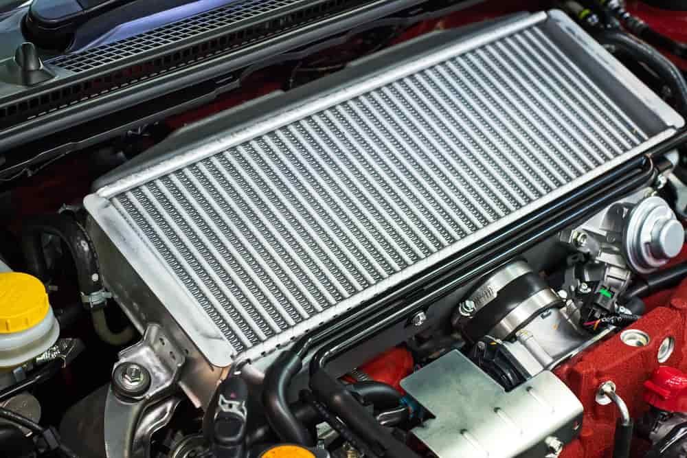 A Close Up of a Car Engine With a Radiator — Shepparton Radiators & Windscreens in Mansfield, VIC