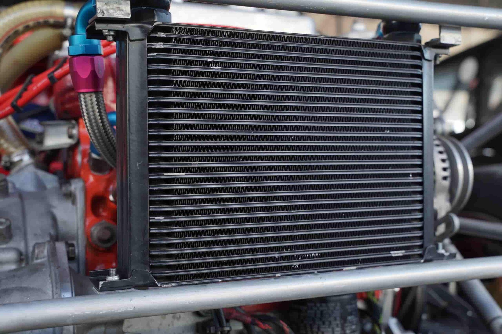 A Close Up of a Radiator on a Car Engine— Shepparton Radiators & Windscreens in Shepparton, VIC