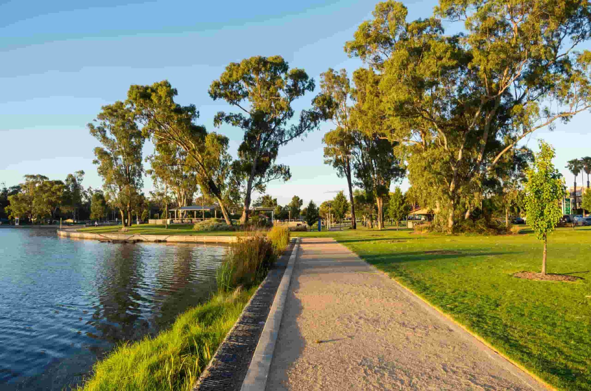 A Path Leading to a Lake Surrounded by Trees and Grass — Shepparton Radiators & Windscreens in Shepparton, VIC