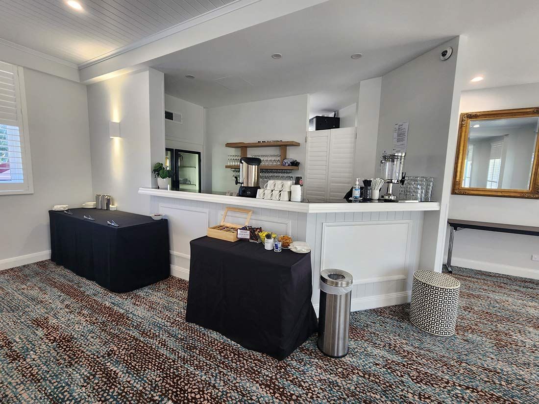 A Room With a Counter and Tables in It — Nick Favot Painting in Bohle, QLD