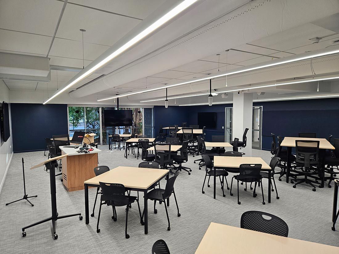 A Large Room With Tables and Chairs in It — Nick Favot Painting in Bohle, QLD