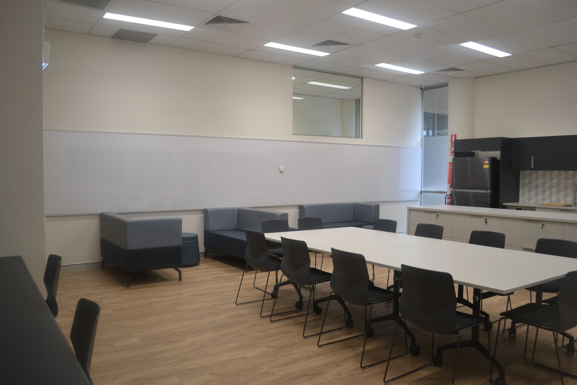 Office Break Room With Wooden Flooring — Nick Favot Painting In Bohle, QLD