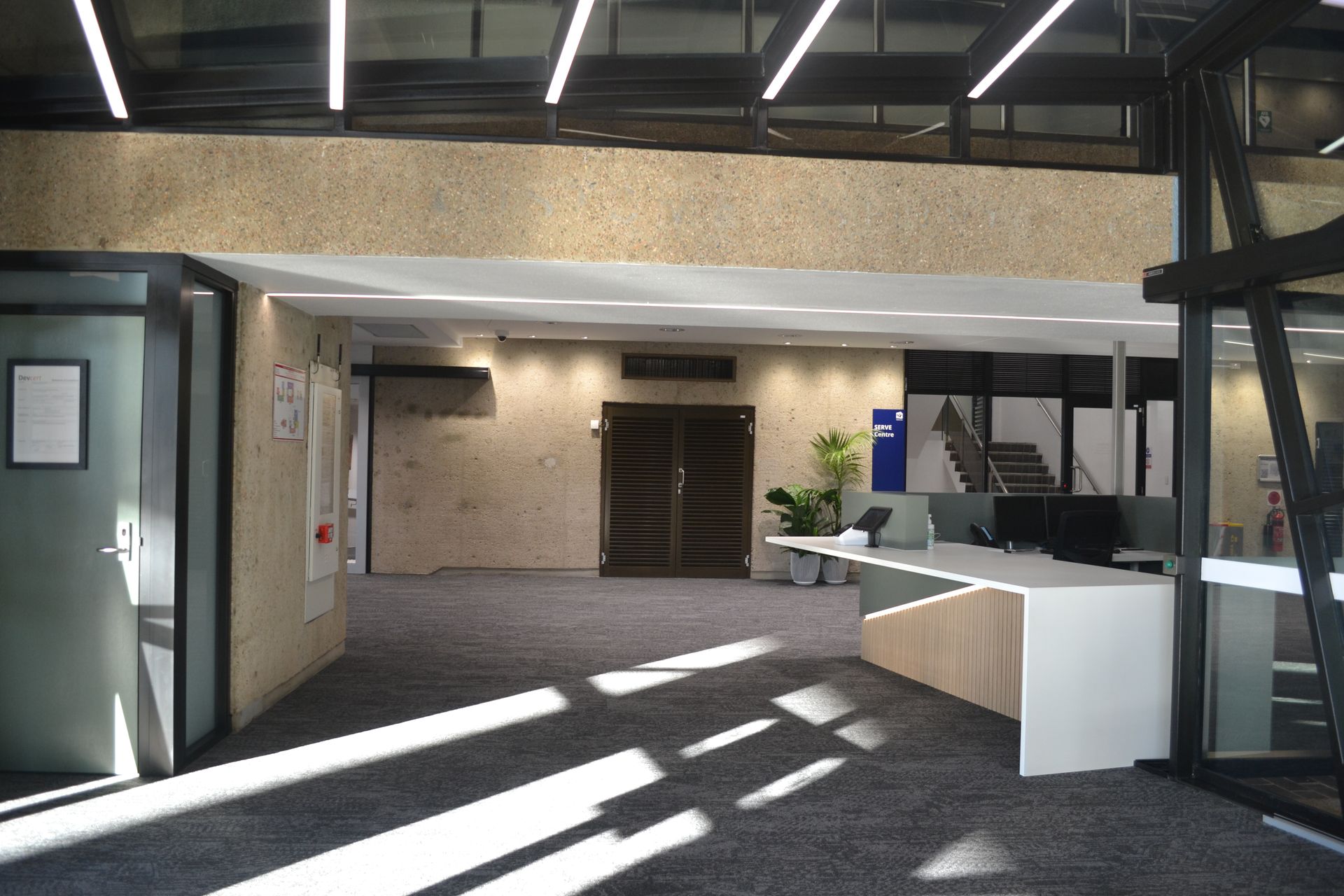 Modern Office Lobby With a Reception Desk — Nick Favot Painting In Bohle, QLD