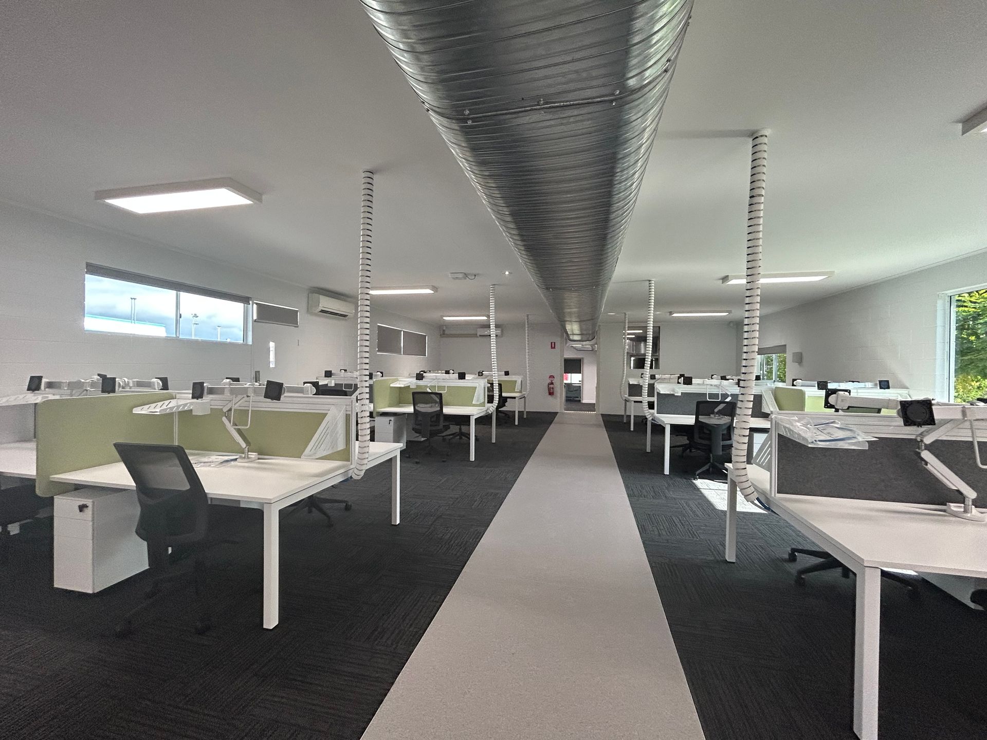 Spacious Modern Office With Rows of White Desks — Nick Favot Painting In Bohle, QLD