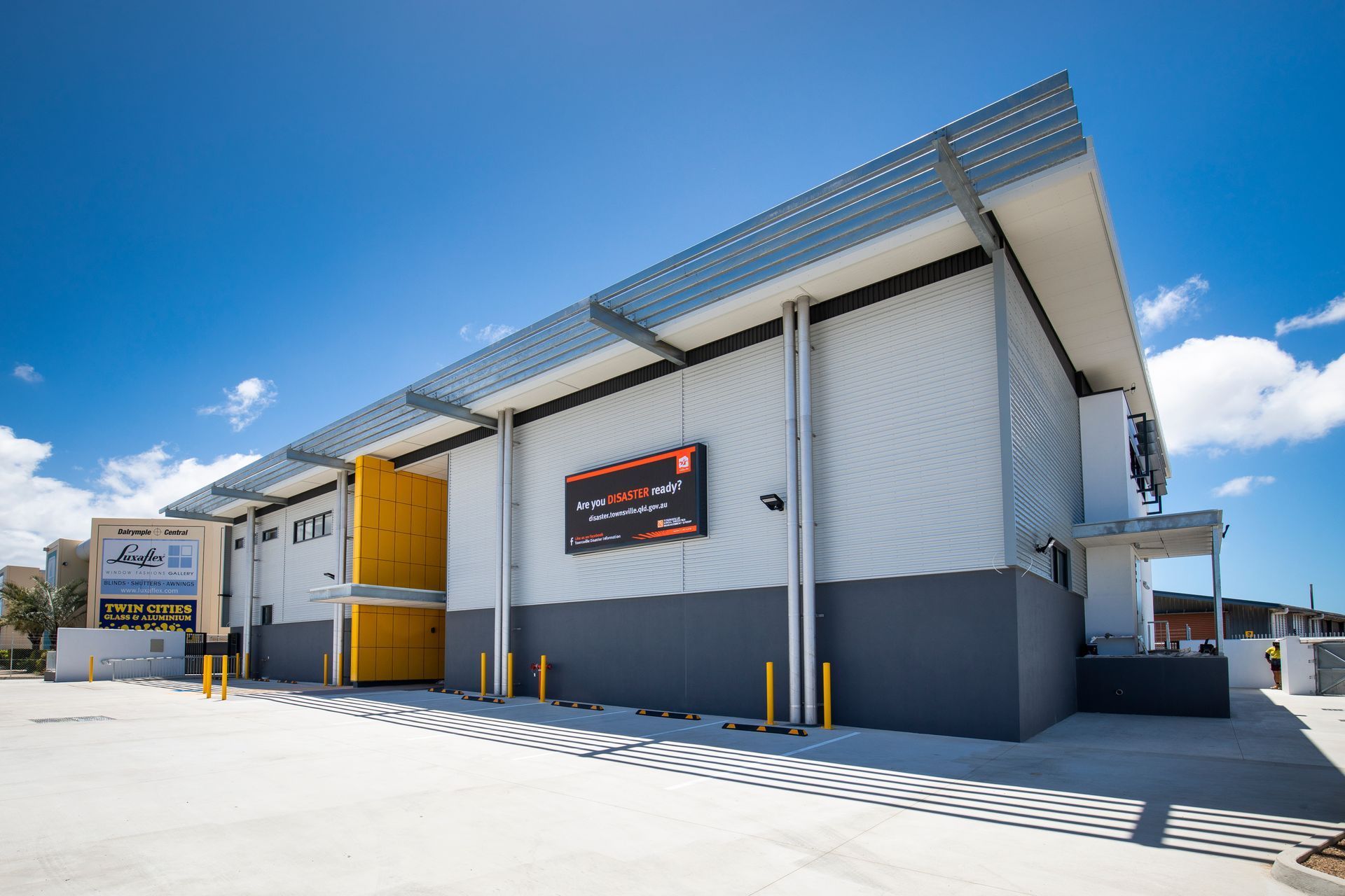 Modern Industrial Building With a Grey Exterior — Nick Favot Painting In Bohle, QLD