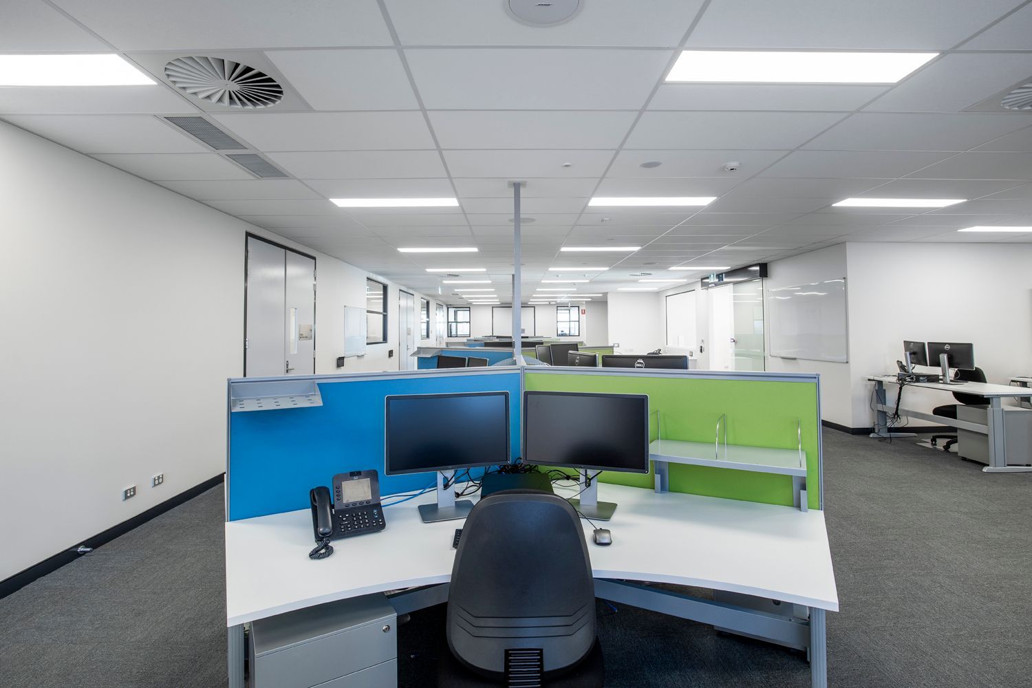 Office With Partitioned Desks Featuring Dual Monitors — Nick Favot Painting In Bohle, QLD