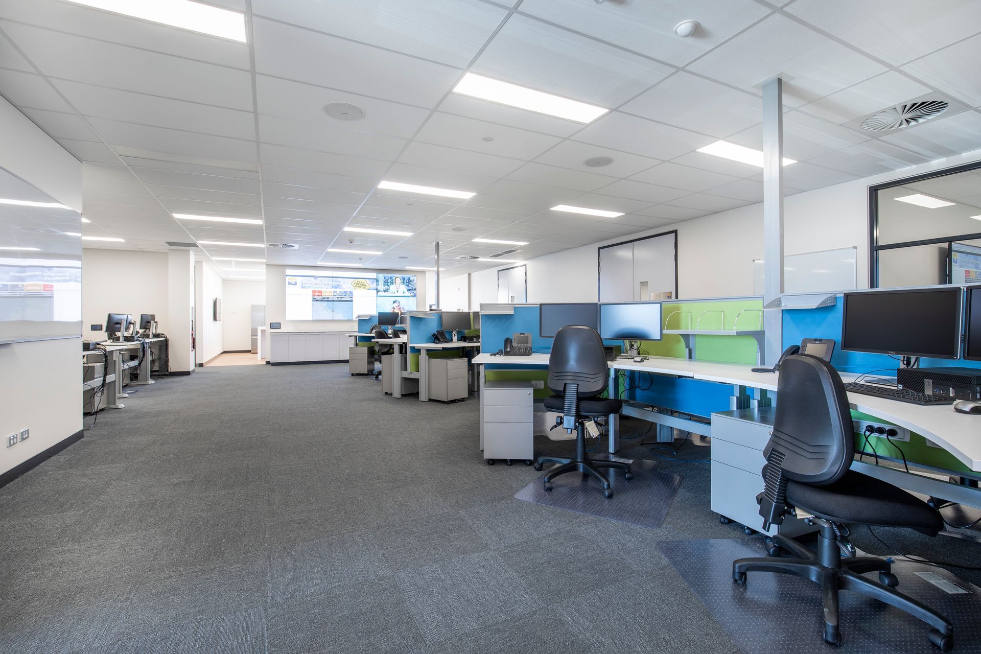 Spacious Office With Multiple Computer Monitors — Nick Favot Painting In Bohle, QLD