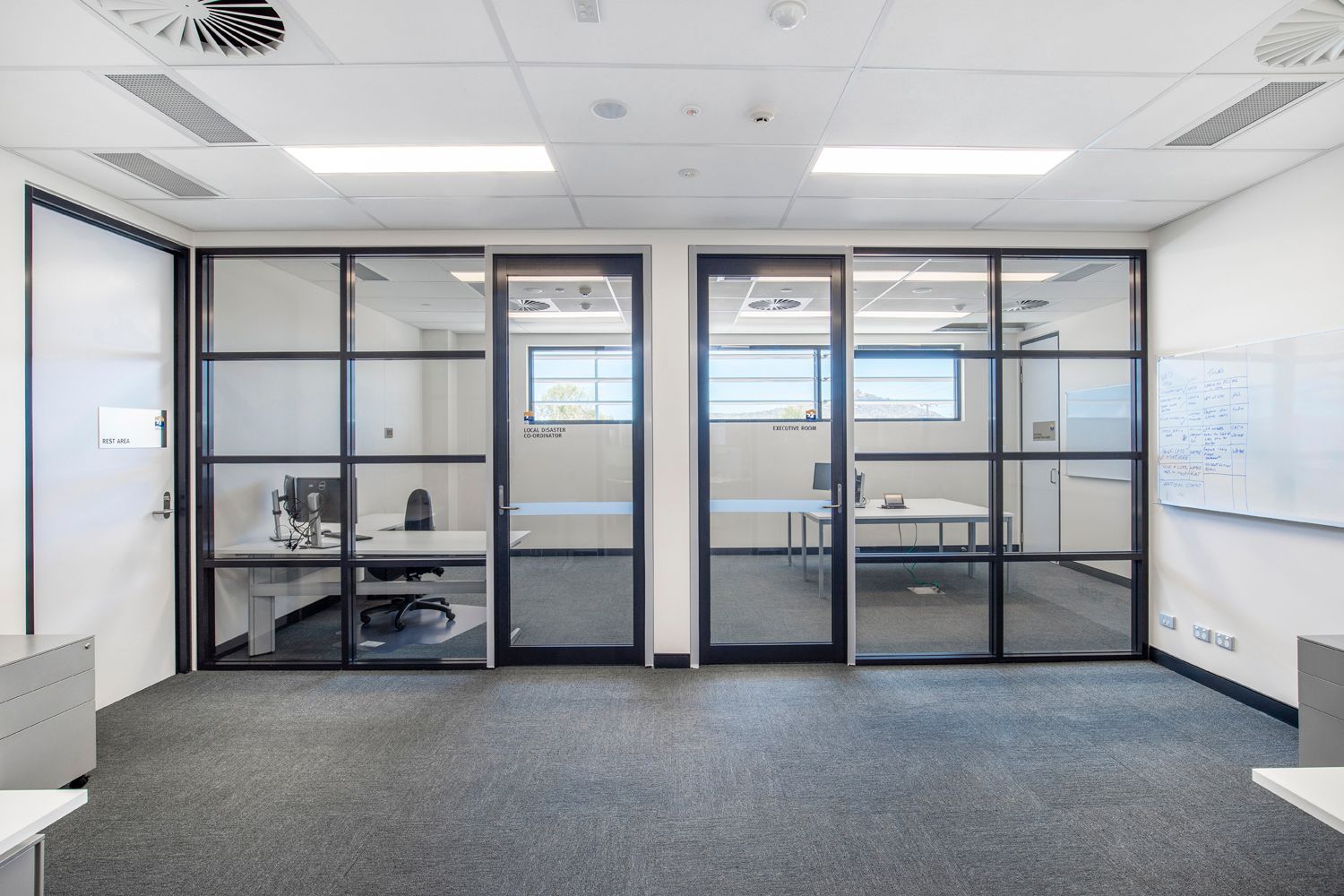 Modern Office With Glass Doors — Nick Favot Painting In Bohle, QLD