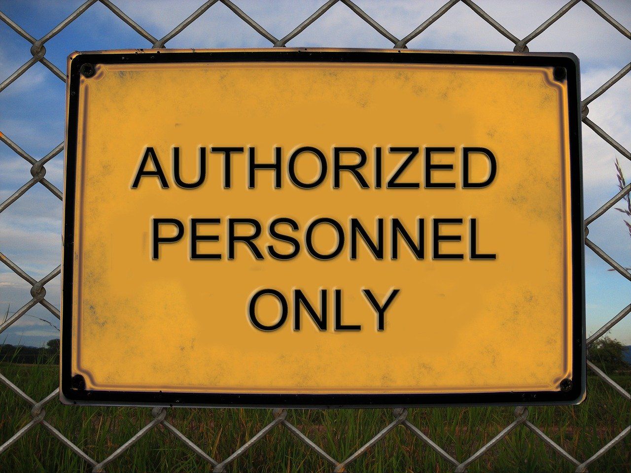 sign that reads authorized personnel only
