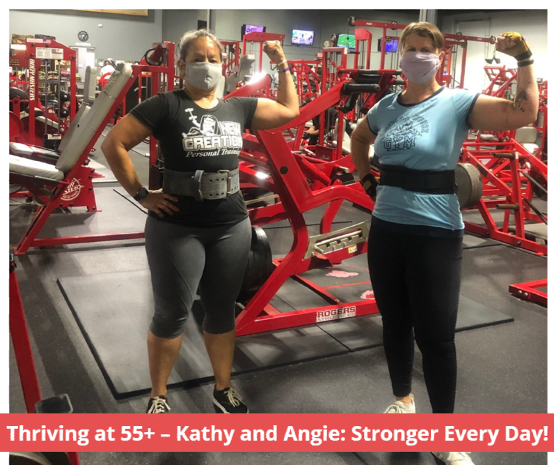 Kathy and angie are posing for a picture in a gym