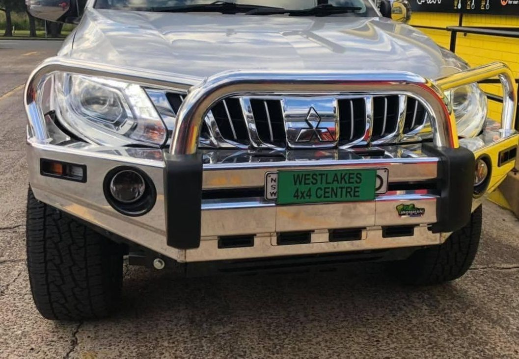 A Silver Truck That is Parked in a Parking Lot — Westlakes 4x4 Centre in Maitland, NSW