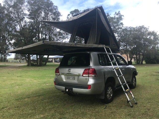 A Silver Suv With a Tent on Top of It — Westlakes 4x4 Centre in Singleton, NSW