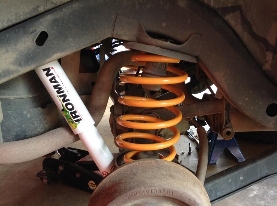 A Close Up of an Ironman Shock Absorber on a Car — Westlakes 4x4 Centre in Singleton, NSW