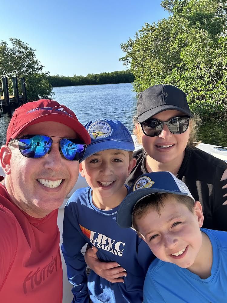 Dr. Charles Brodsky with his wife Vicky and sons Jack and Blake enjoying time together on the water
