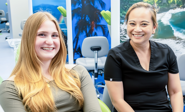 Brodsky Orthodontics patient with a team member