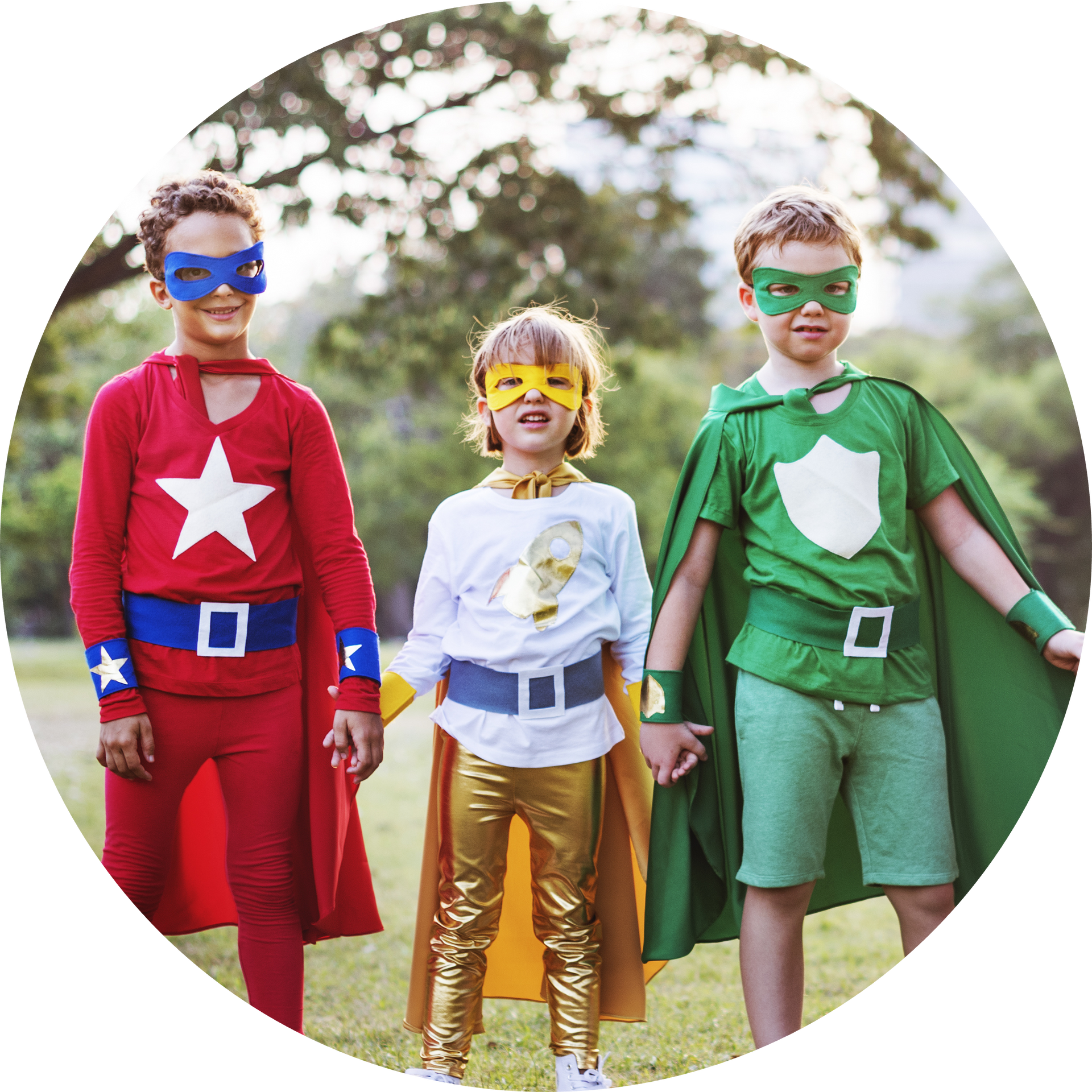 Three children dressed in superhero costumes are standing next to each other in a circle.