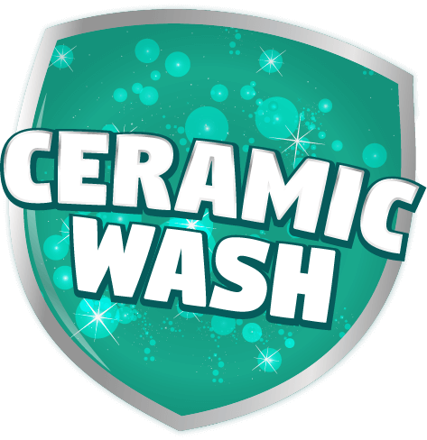 a green shield with sparkles and the words ceramic wash on it