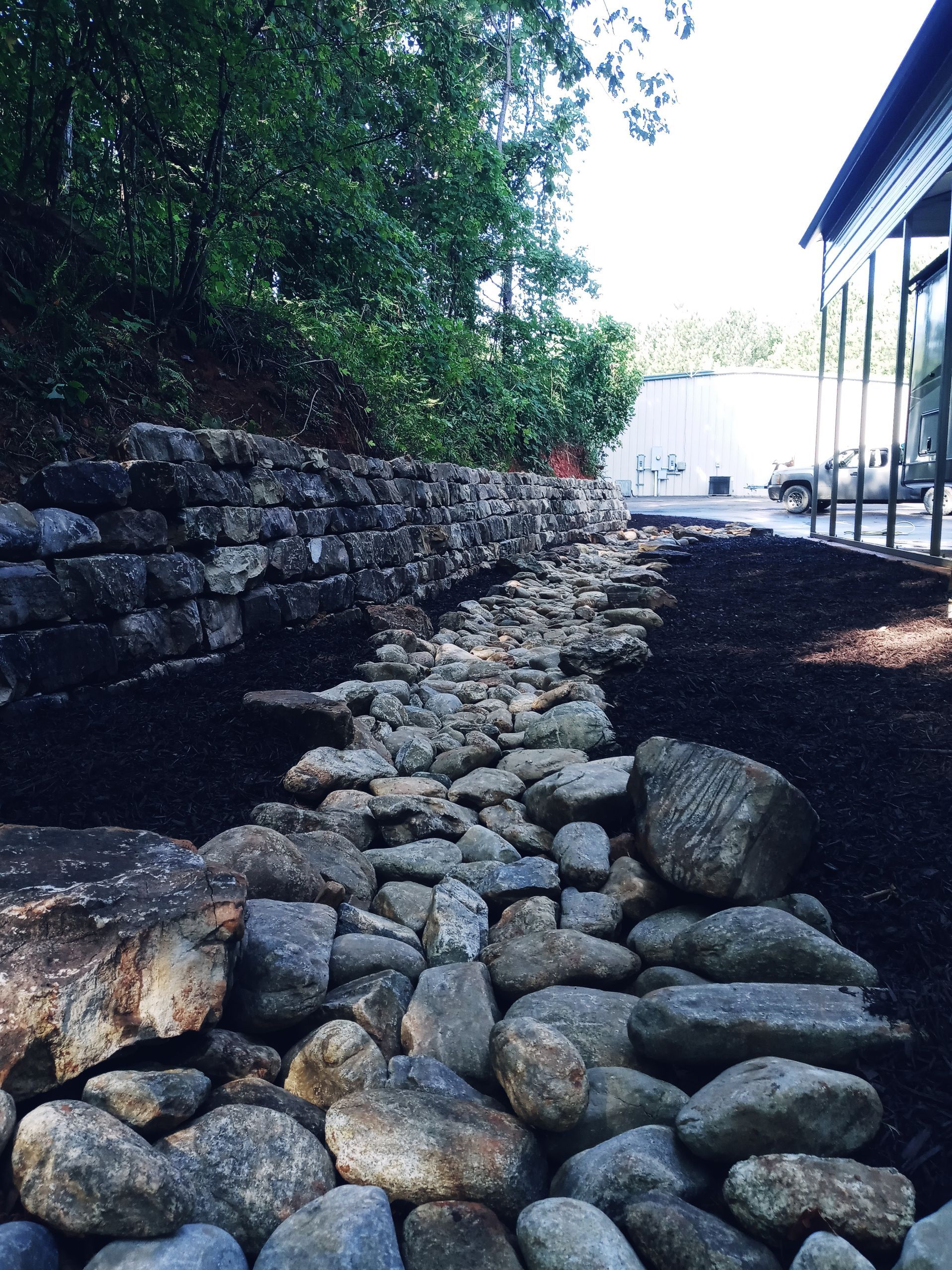 A path made of rocks leading to a building