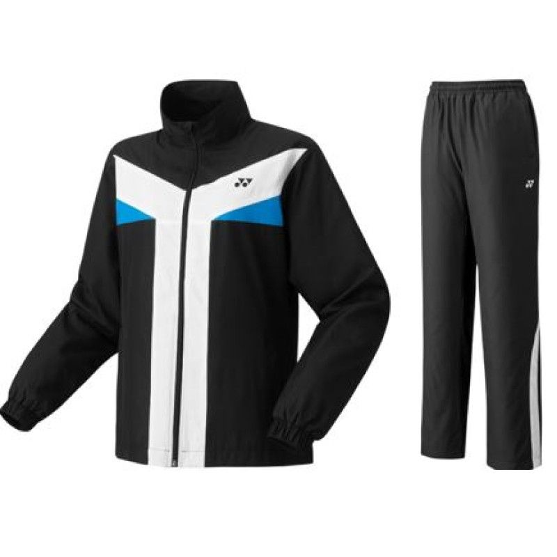 Zwart-wit sportief trainingspak met blauwe accenten, bestaande uit een jasje en een broek.