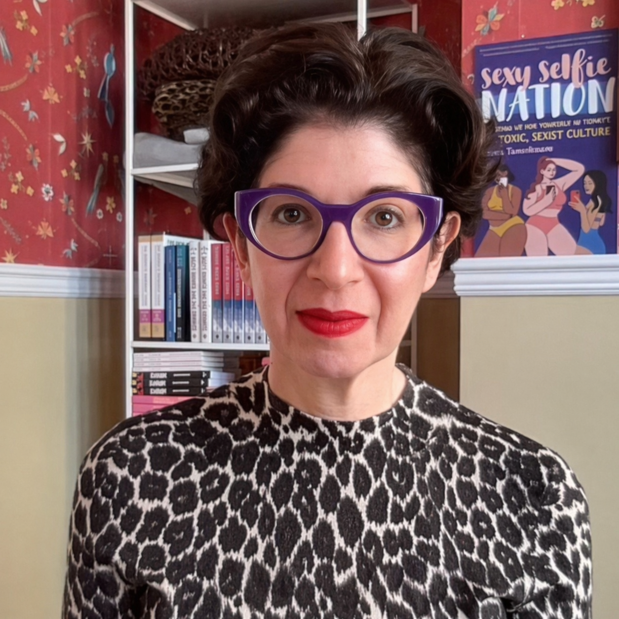 Slut-shaming expert and author Leora Tanenbaum taking a selfie with her  phone.