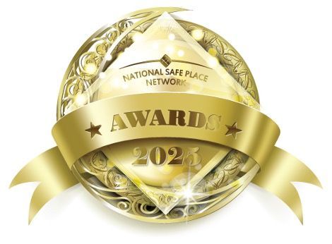 Gold National Safe Place Network Awards 2023 logo, circular design with ribbon and stars.