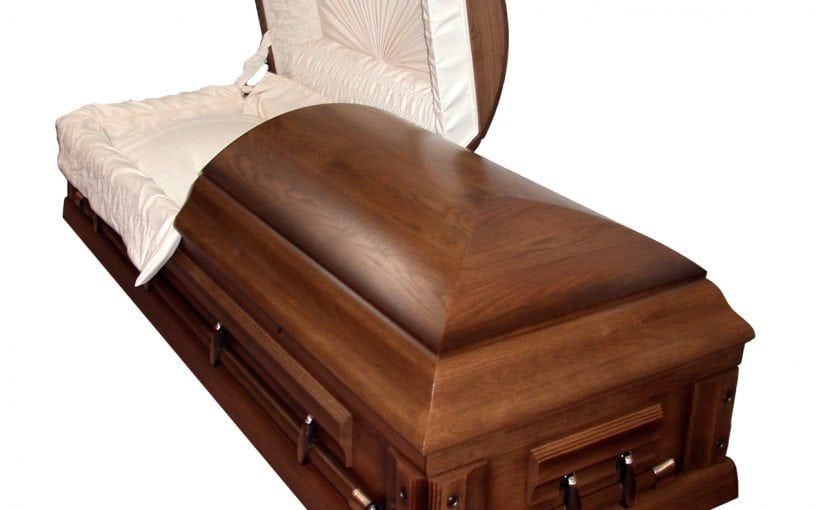 Wooden casket with open lid, brown finish, white interior lining.