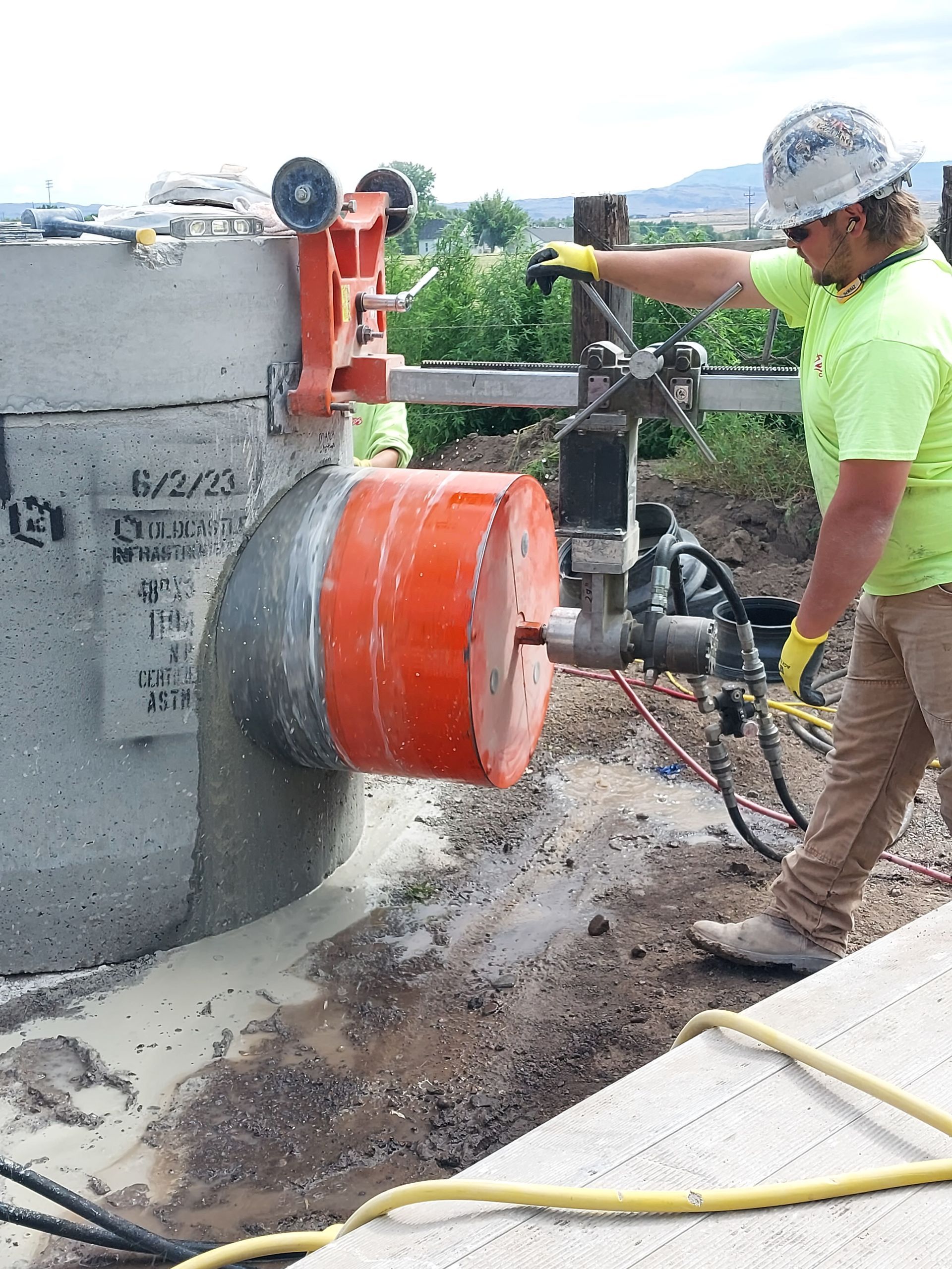 Construction Worker Using A Machine — Caldwell, ID — ACDS Concrete Cutting