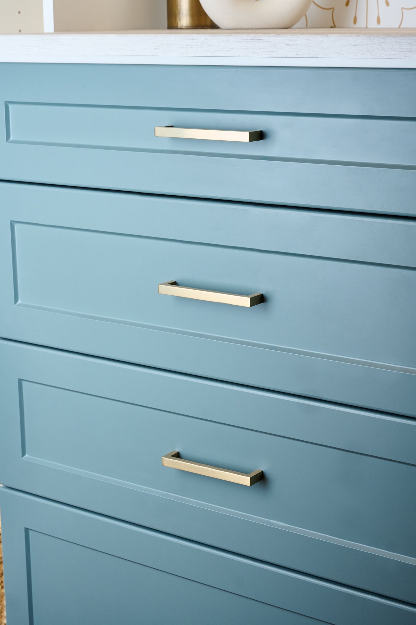 Lagoon and white closet drawers