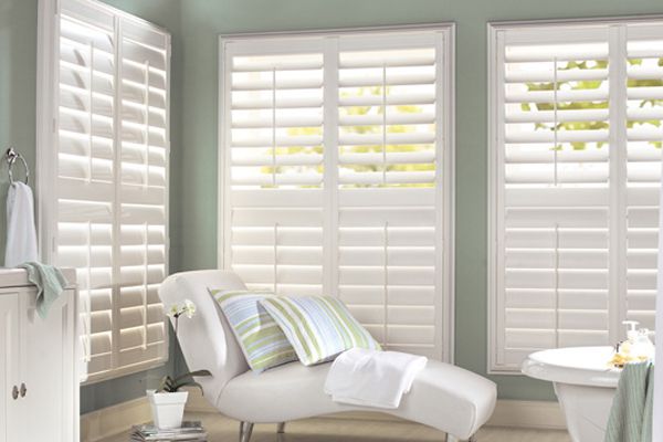 PVC Plantation Shutters And White Chaise Lounge — Wholesale Window Coverings in Port Stephens, NSW