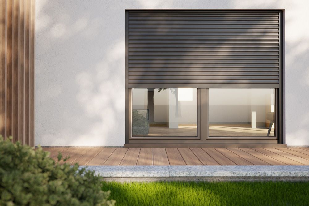 Modern House With Window Roller Shutter — Wholesale Window Coverings in Lake Macquarie, NSW