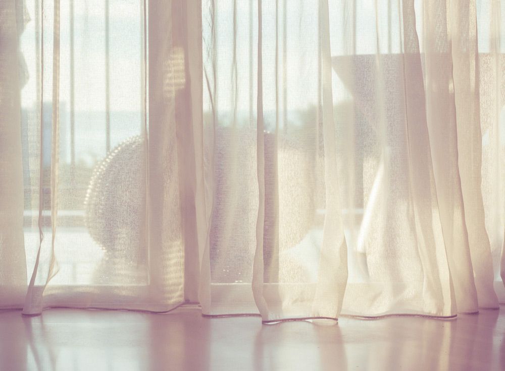 Door Curtain With Sunlight In The Morning — Wholesale Window Coverings in Newcastle, NSW