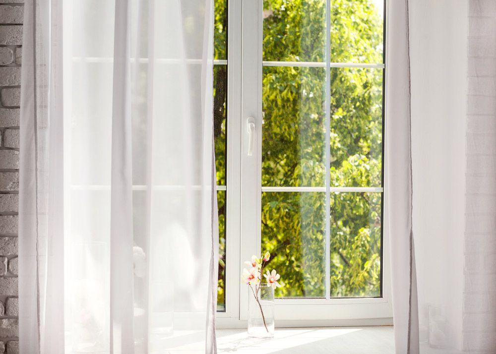 Window With Curtains — Window Coverings in Cardiff, NSW