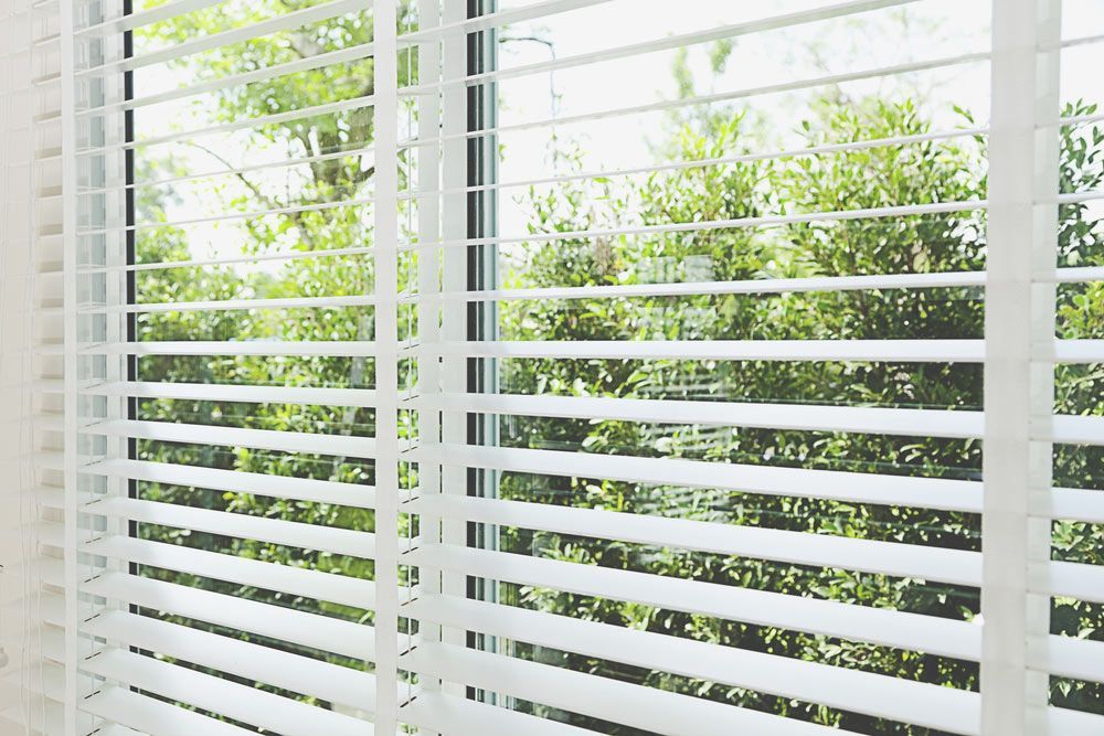 Window With White Blinds — Wholesale Window Coverings in Newcastle, NSW