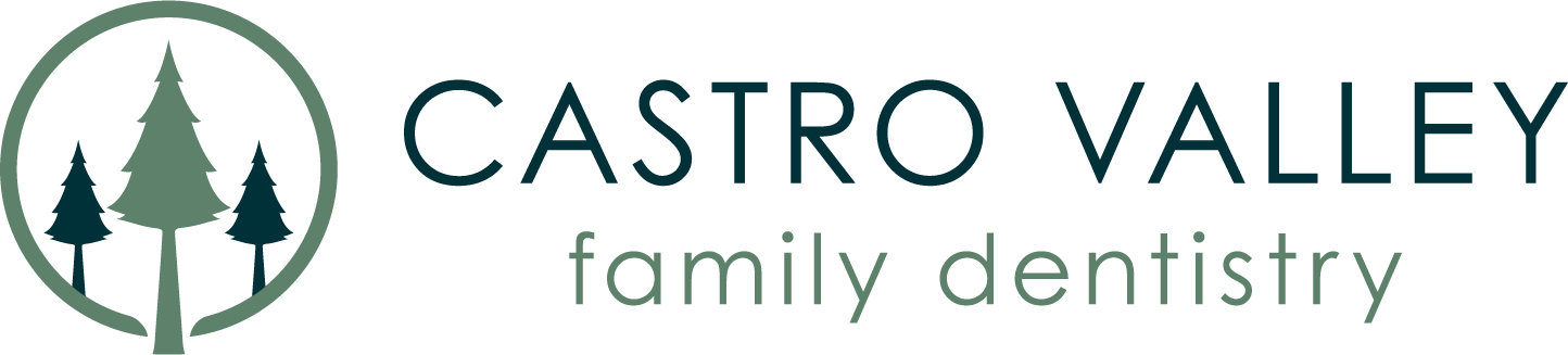 The logo for castro valley family dentistry has three trees in a circle.
