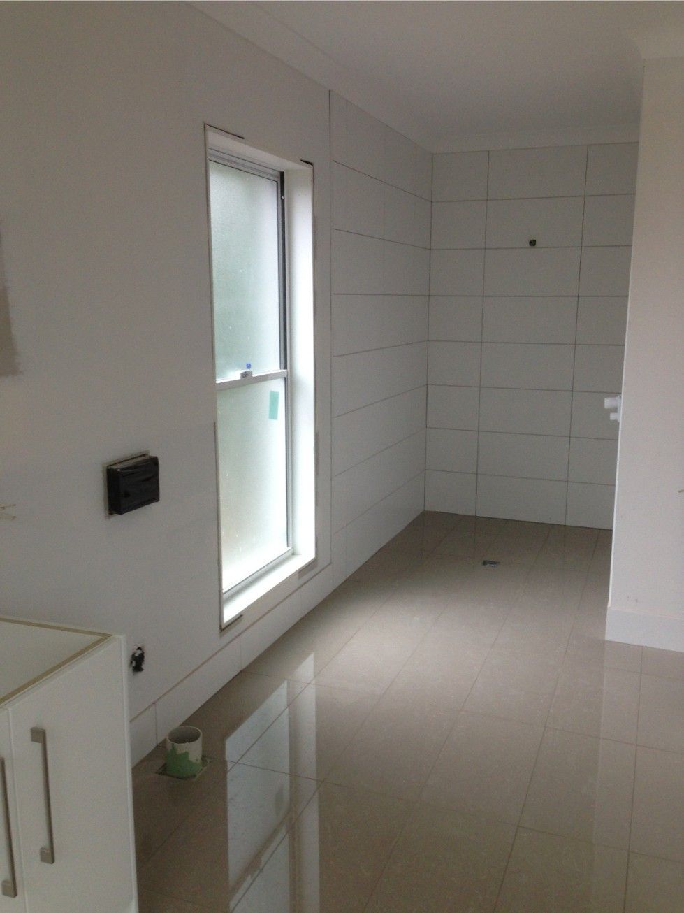 A Room With a Window, White Walls, and Tiled Floor — Worrall Tiling in South Kempsey, NSW