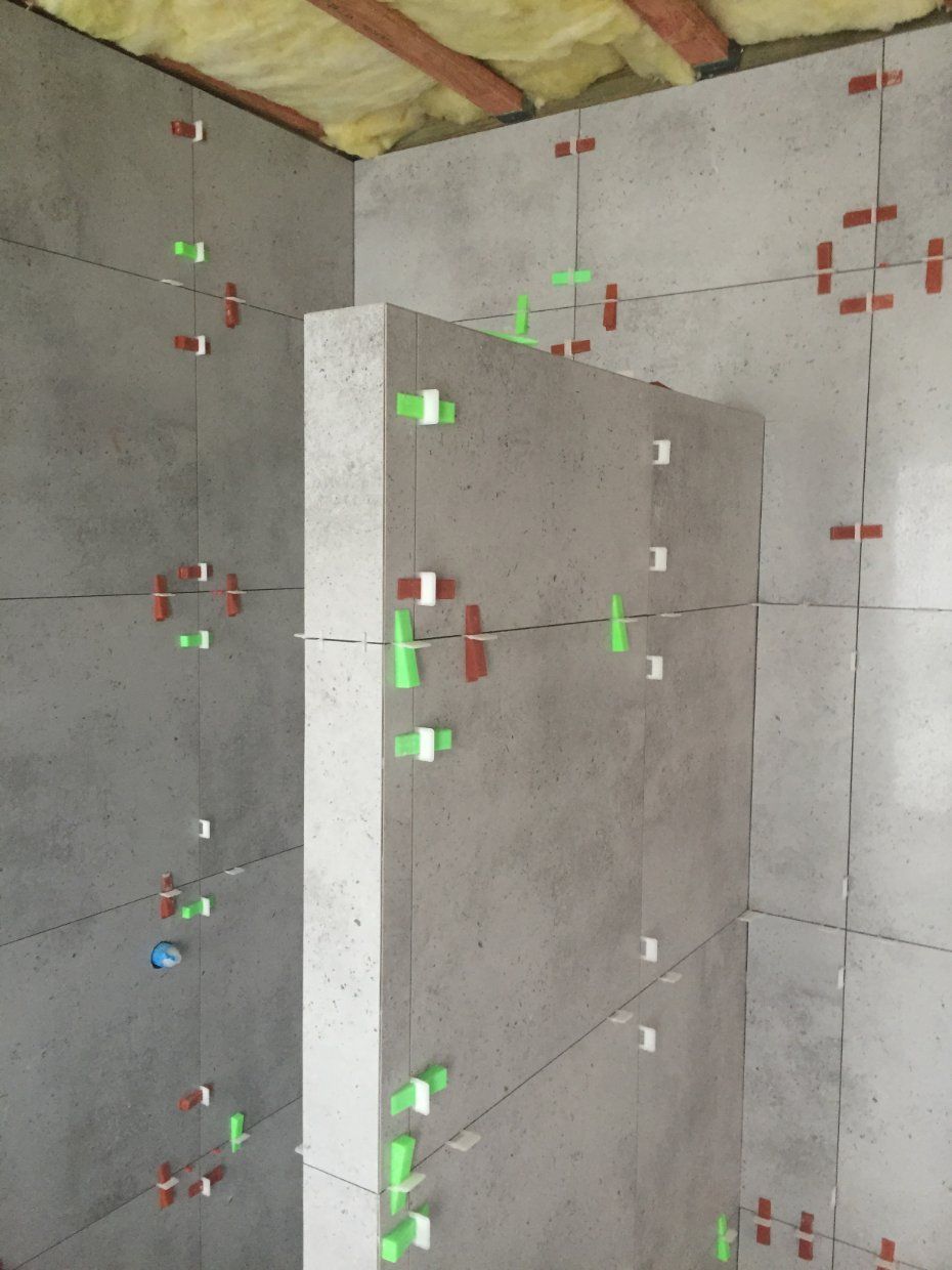 Gray Wall Tiles Installed With Leveling Spacers — Worrall Tiling in South Kempsey, NSW
