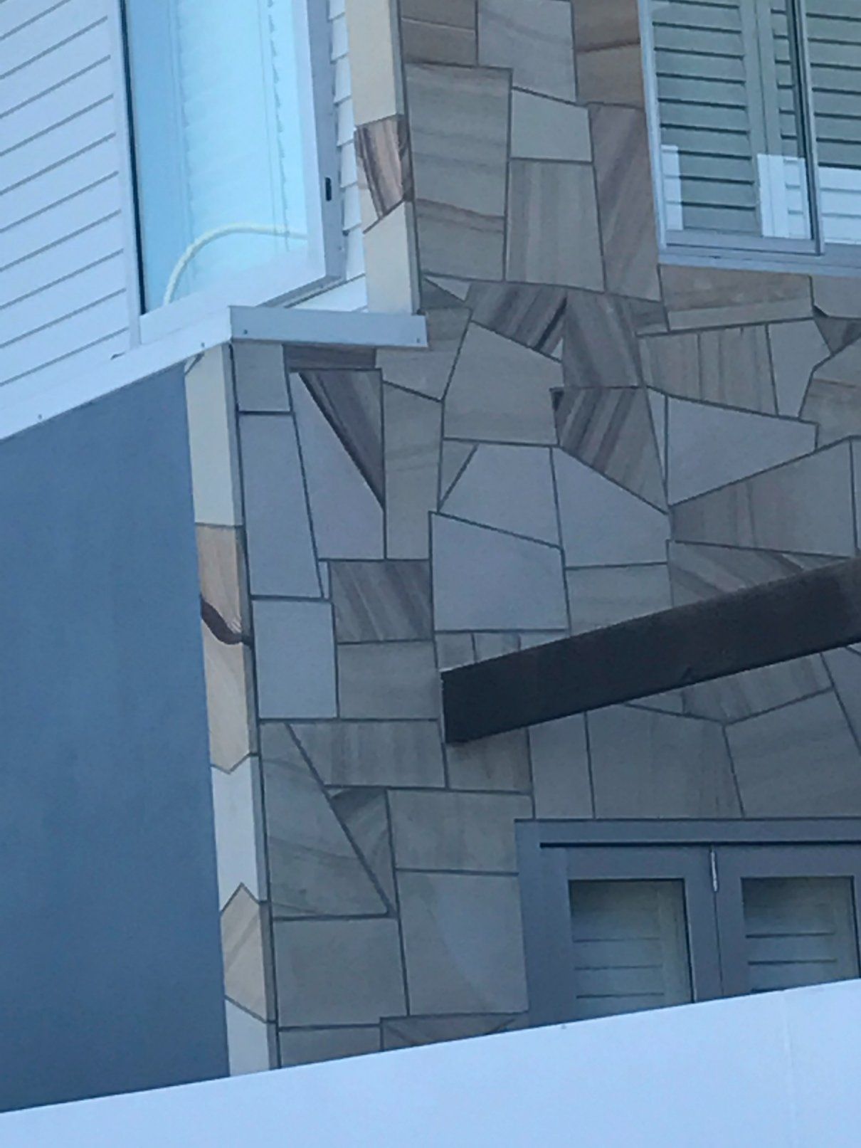 Exterior View of a Building With Sandstone Cladding — Worrall Tiling in South Kempsey, NSW
