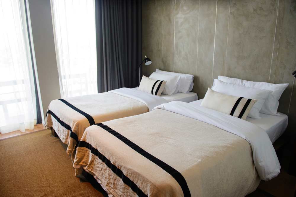 Modern Room With Twin Beds Interior — Accommodation In Chinchilla, QLD