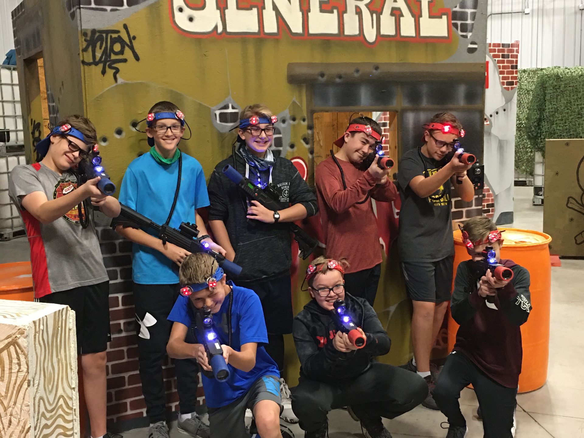 group of young men dressed to play laser tag