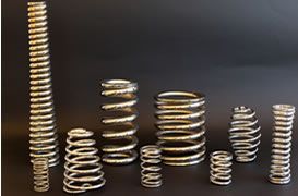 There are many different types of springs on the table.