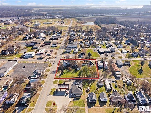 An aerial view of a residential area with lots of houses and trees.